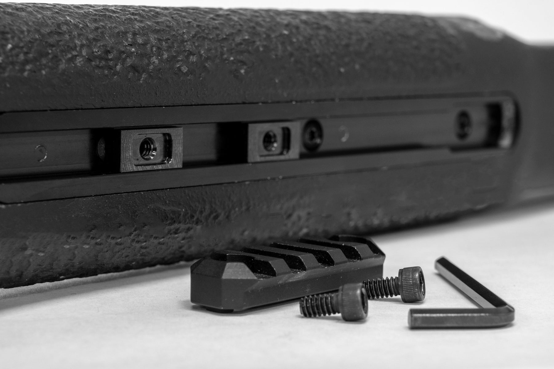 a black and white photo of a skateboard