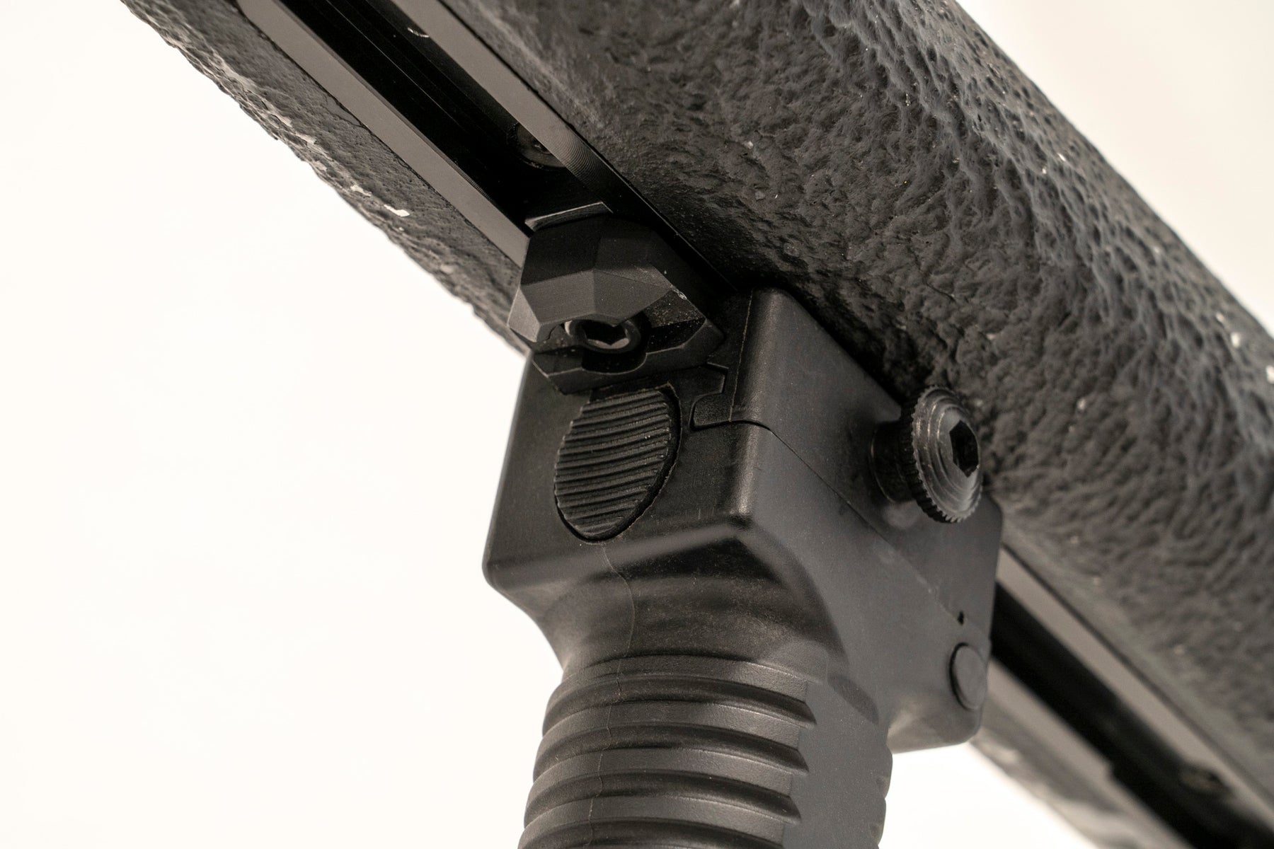 a close up of a baseball cap with a baseball bat