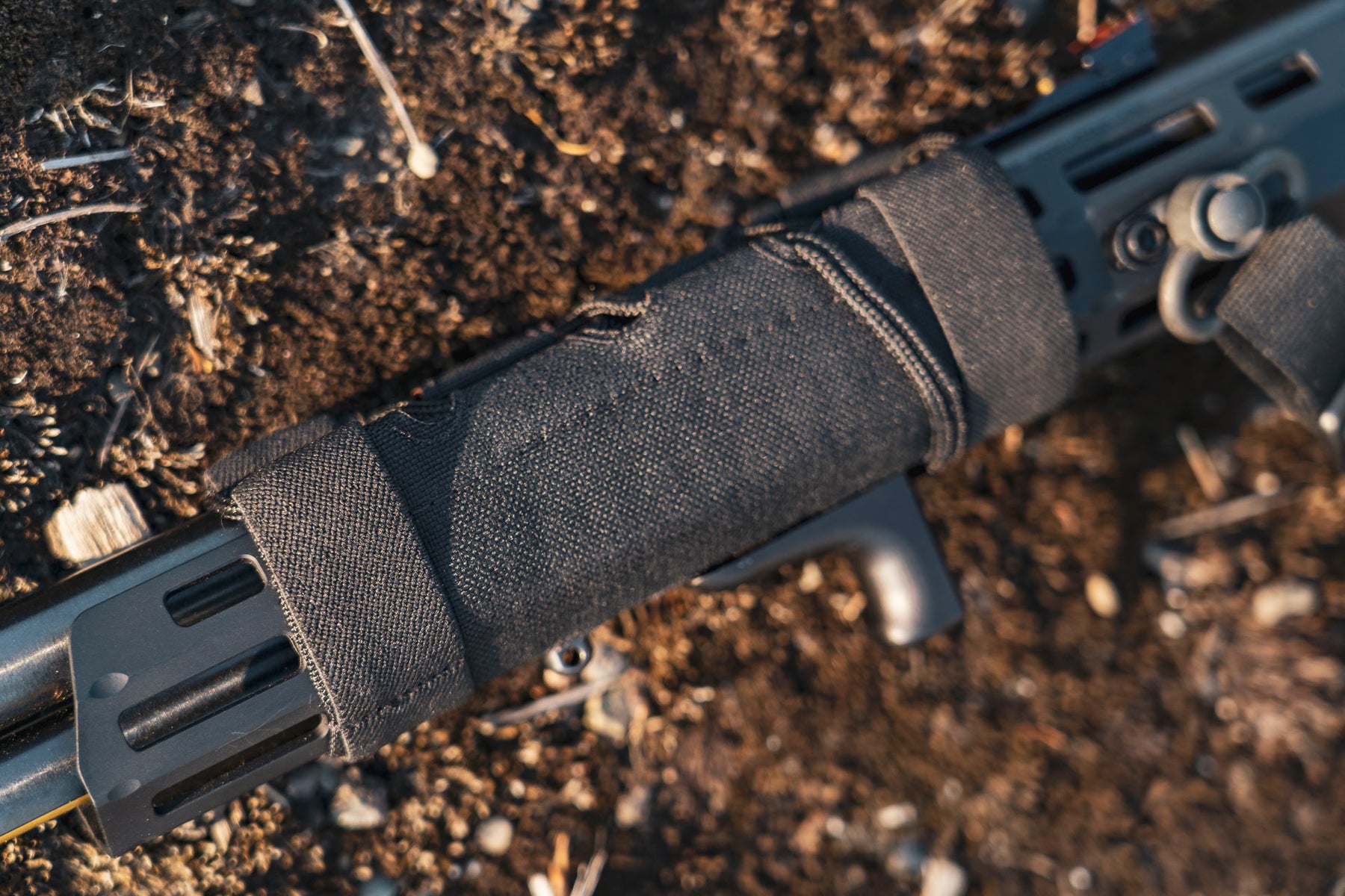 a close up of a knife on a piece of wood 